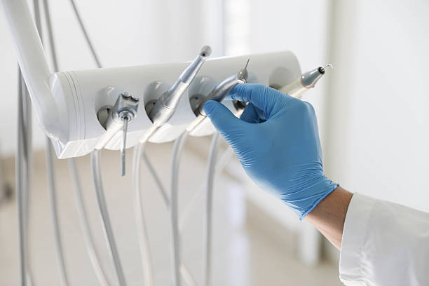 Professional Tooth Extraction technician working in Brisbane, CA